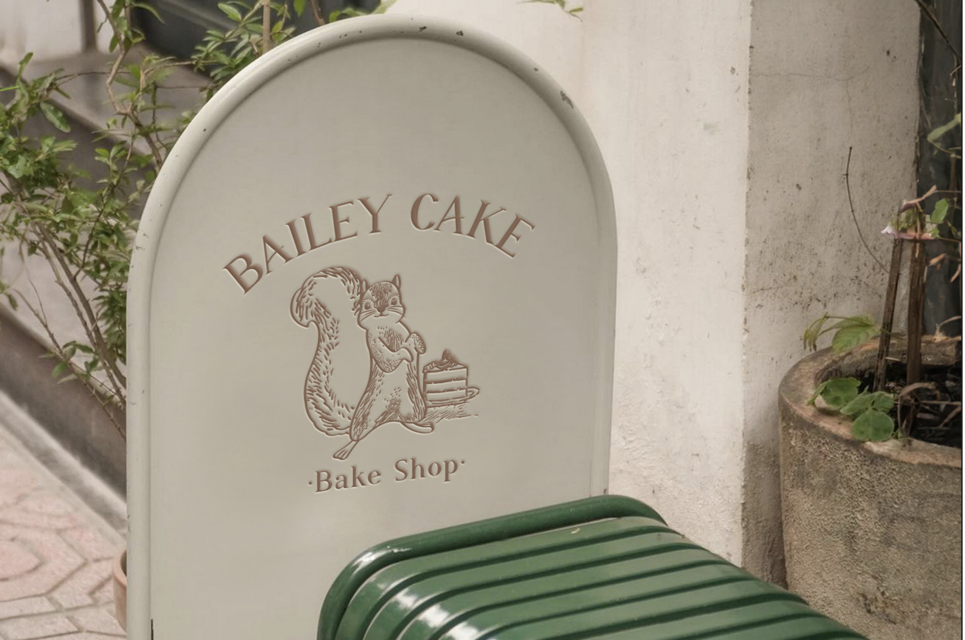 ‘BAILEY CAKE’와 ‘Bake Shop’ 문구가 적힌 간판이 보이고, 다람쥐 일러스트와 케이크 그림이 함께 있다.